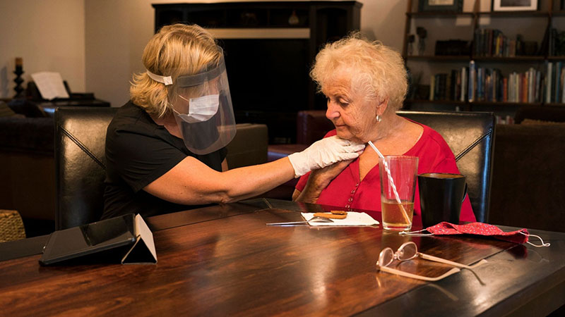 Doctor checking the old lady