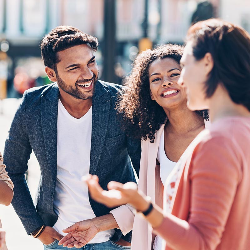 group of friends laughing and talking