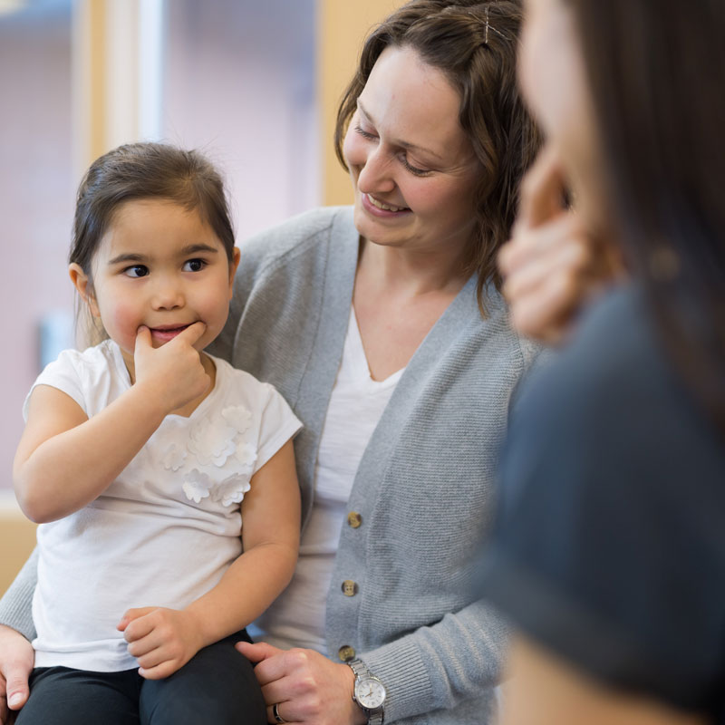 young girl having speech therapy