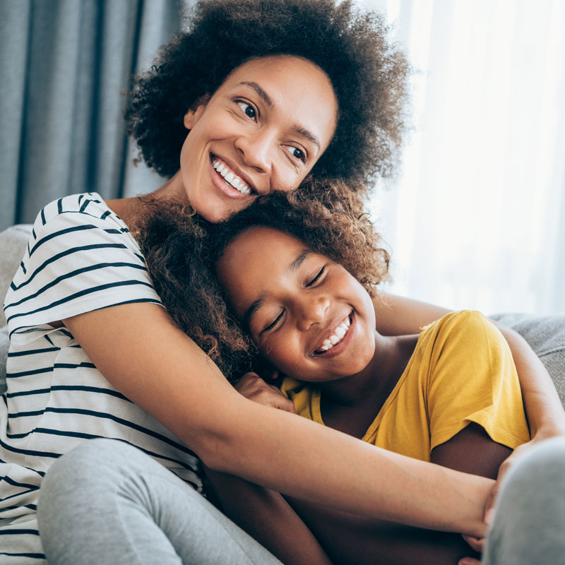 mom and daughter on couch