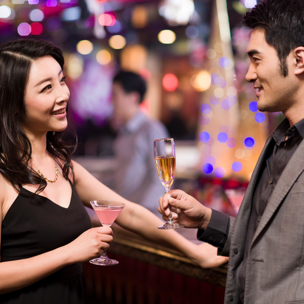 adults talking in a bar