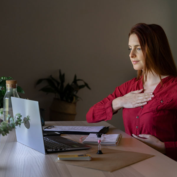 woman doing voice training online
