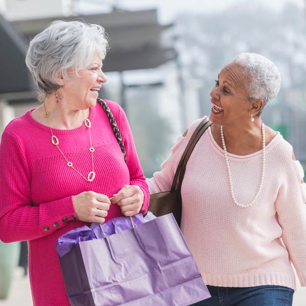 two mature women shopping